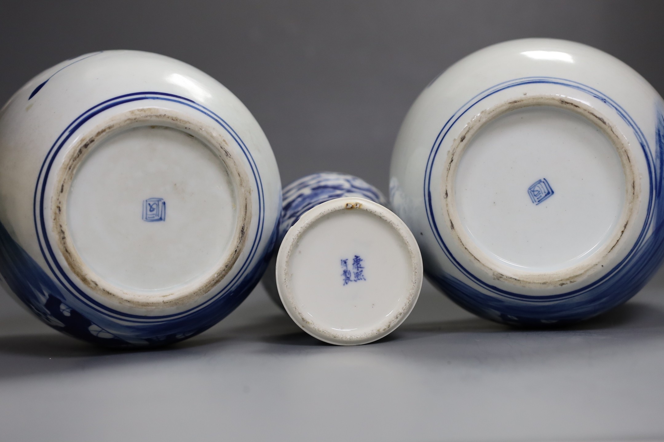 A 19th century Chinese blue and white vase (a.f) and two later jars and covers, tallest 19cm